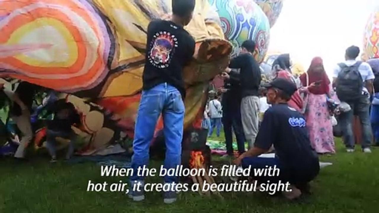 Hot air balloons fill Indonesian sky as part of [Video]