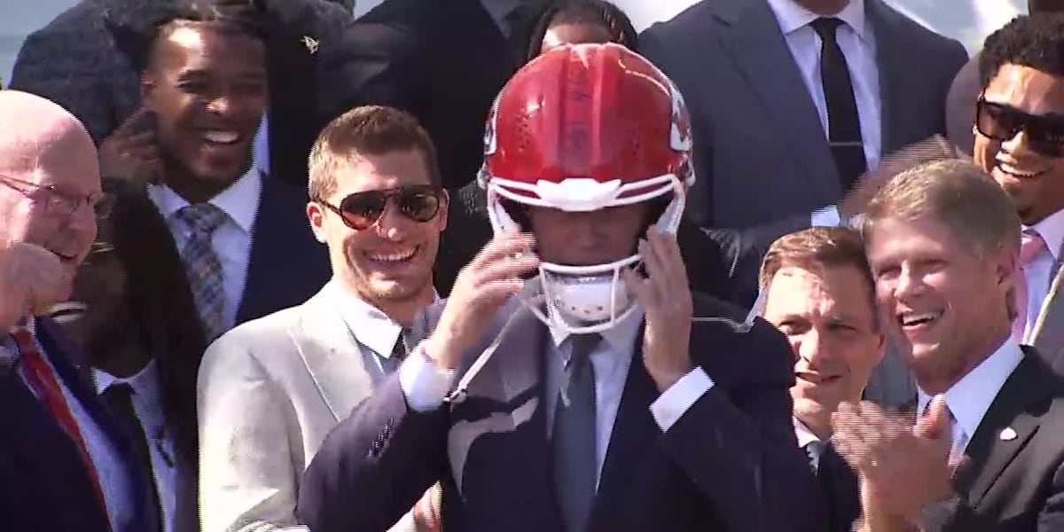 Biden with Kansas City Chiefs helmet [Video]